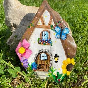 Gnome door/house painted river rock.